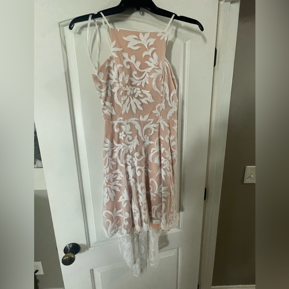 NWT.  White/tan sequin party dress.  Short in front/ longer train in back.